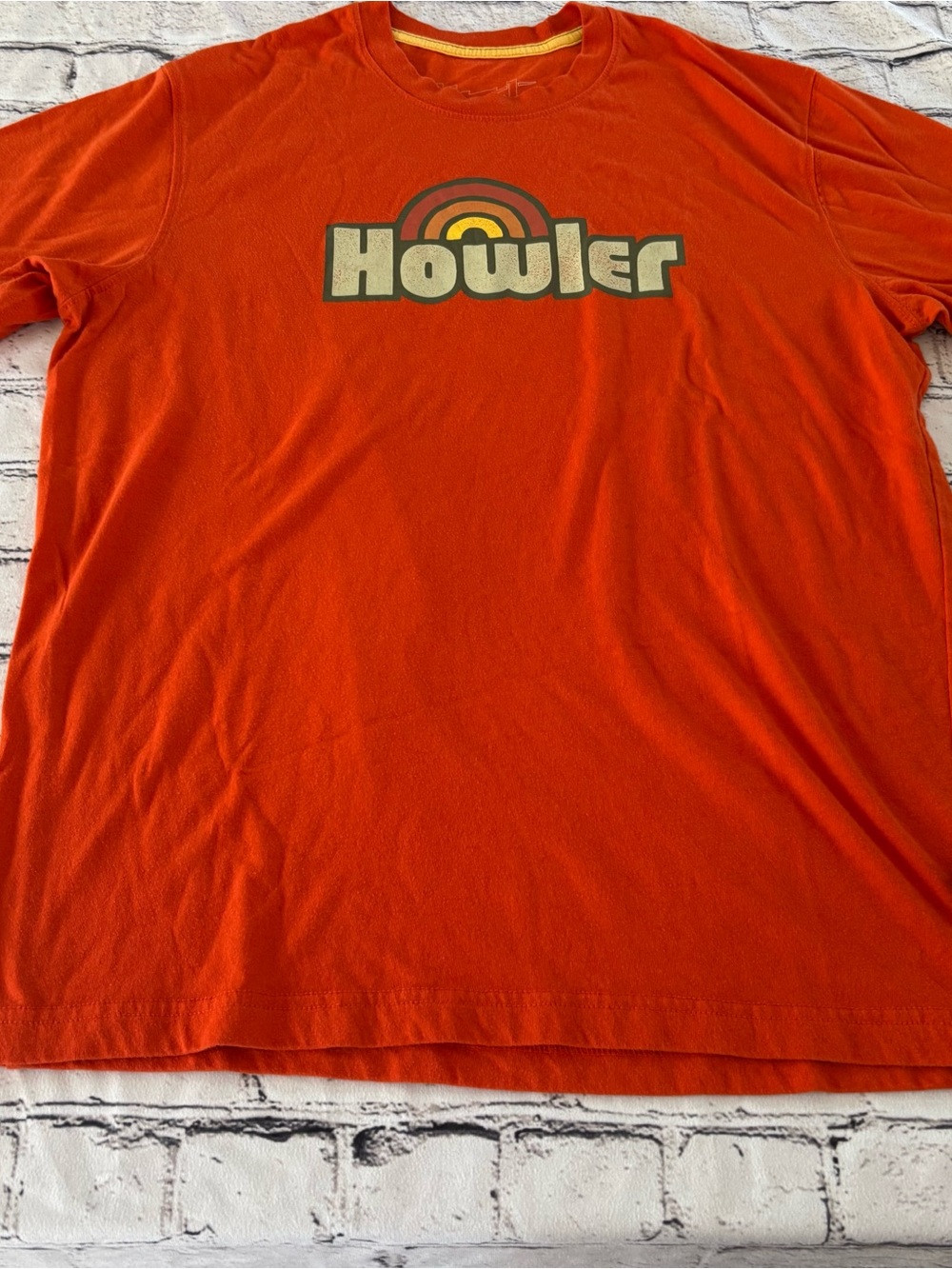 Howler Brothers Orange Tee with Retro Chest Logo